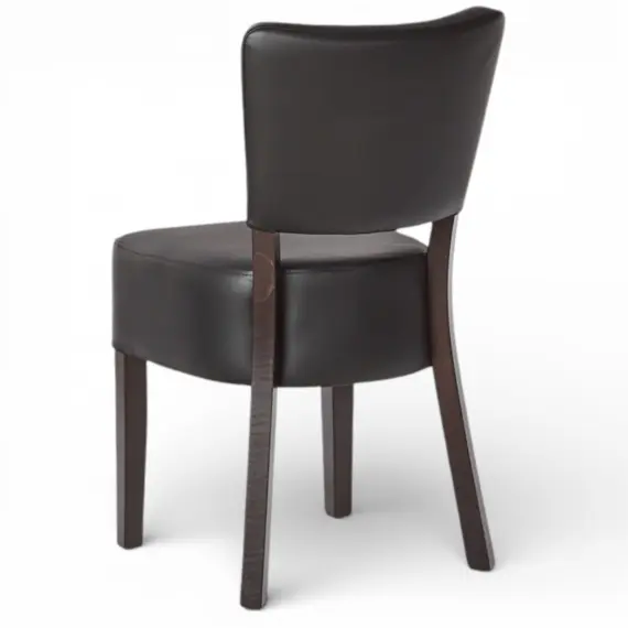 Oregon upholstered restaurant chair back view with dark wood legs and black vinyl seat